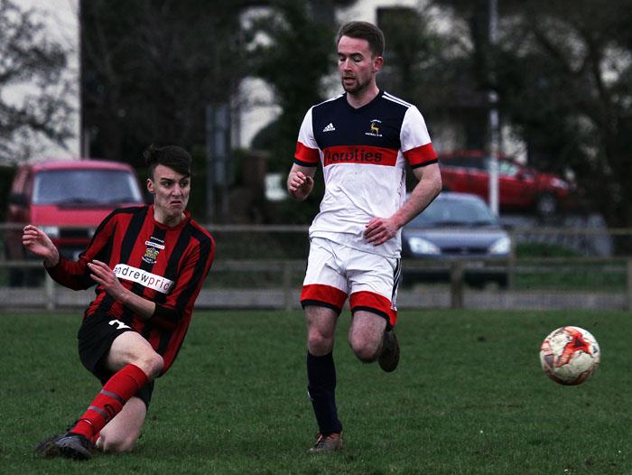 Curtis Hicks clears the danger for Tenby against Lamphey